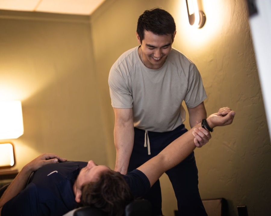 Cass treating a patient at Adlabs
